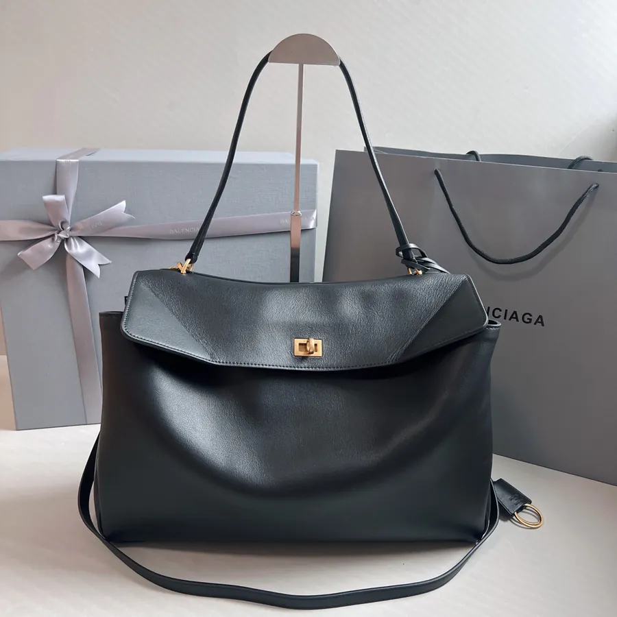 Baleenciag Rodeo Luxury Bucket Bag with Grained Calfskin