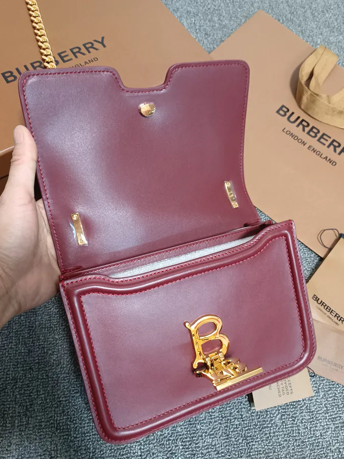 Thomas Burberry TB Exclusive Lock Clutch