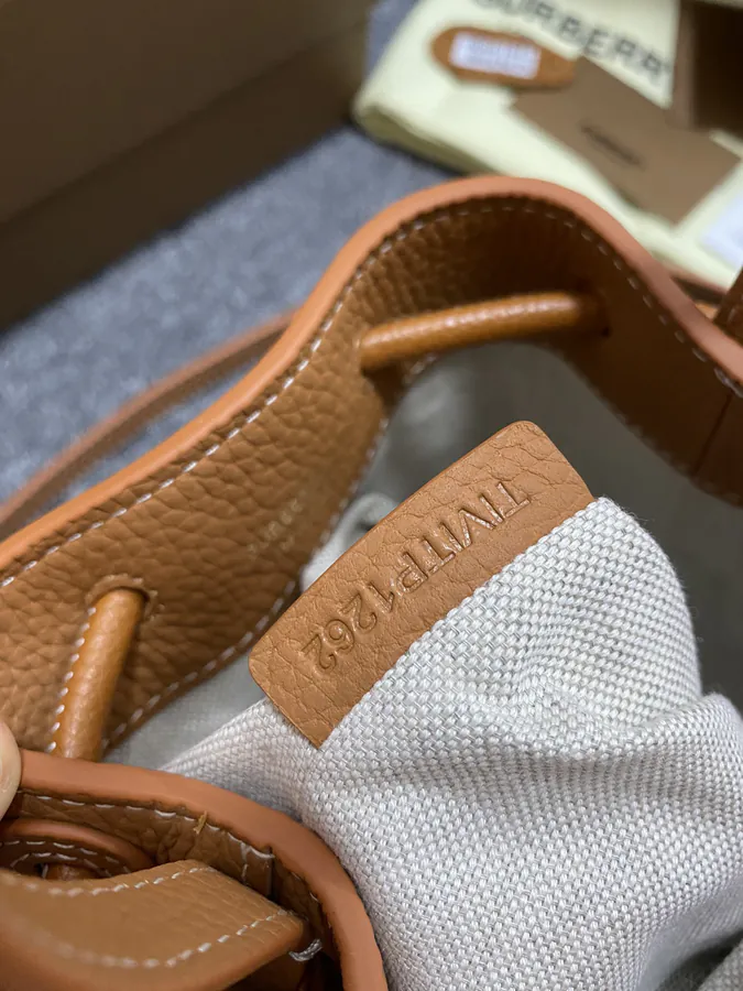 TB Exclusive Lock Clasp Mini Bucket Bag in Grained Calfskin