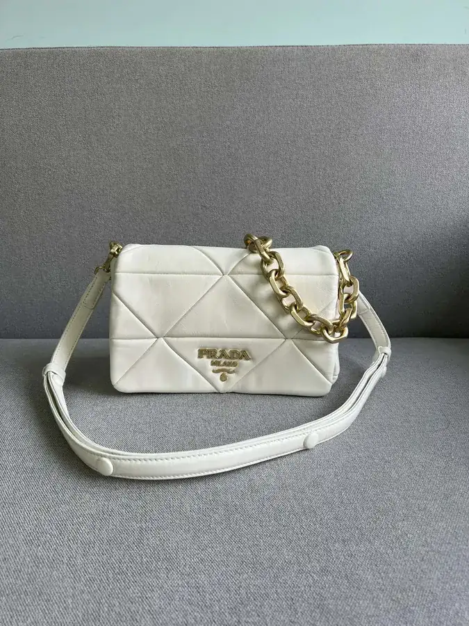 System Soft Leather Crossbody Bag with Triangular Pattern