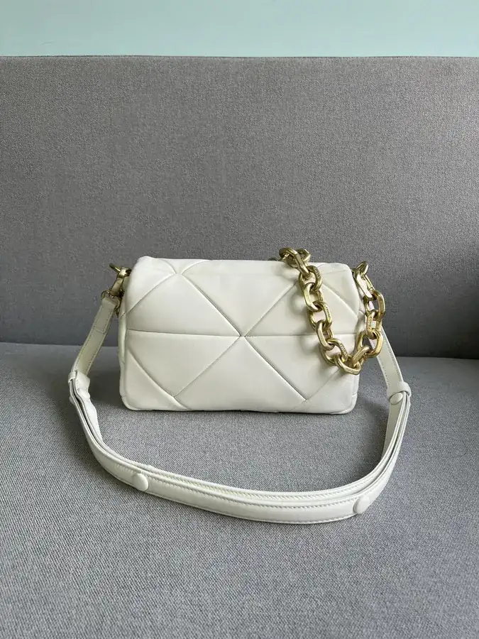 System Soft Leather Crossbody Bag with Triangular Pattern