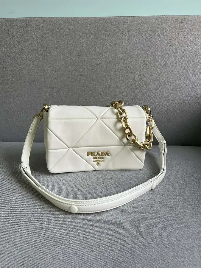 System Soft Leather Crossbody Bag with Triangular Pattern