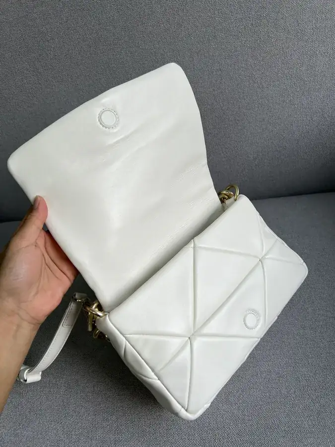 System Soft Leather Crossbody Bag with Triangular Pattern