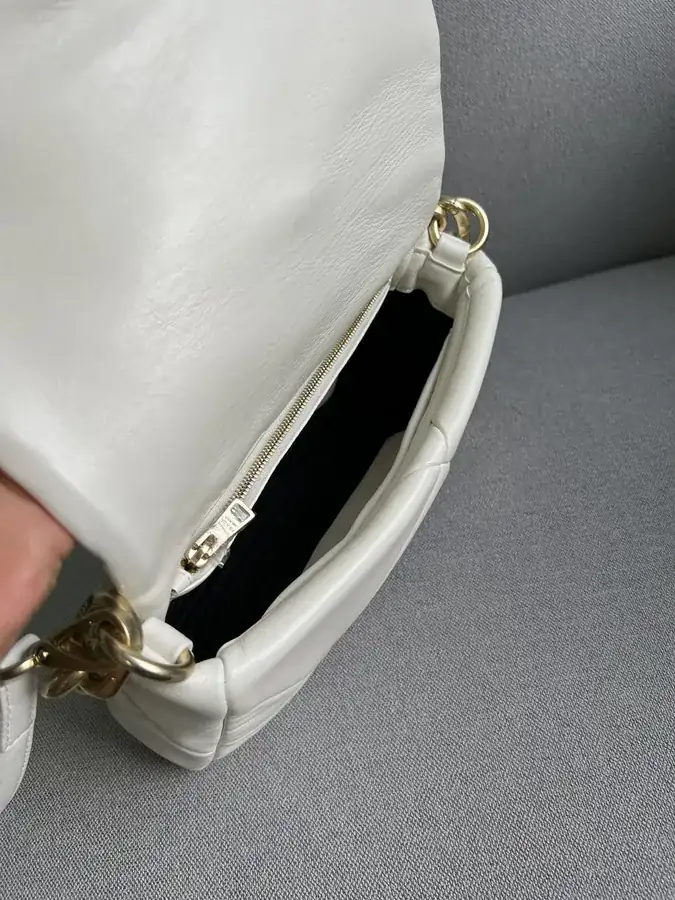 System Soft Leather Crossbody Bag with Triangular Pattern