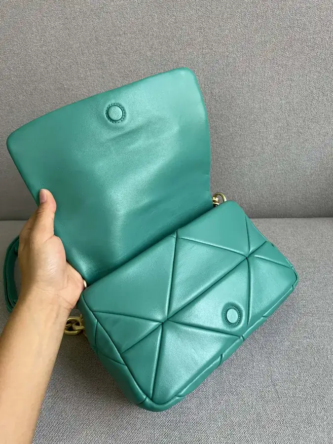 System Soft Leather Crossbody Bag with Triangular Pattern