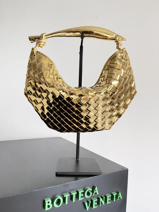 Muse Bronze Handle Sardine Bag Modern Sculptural Design