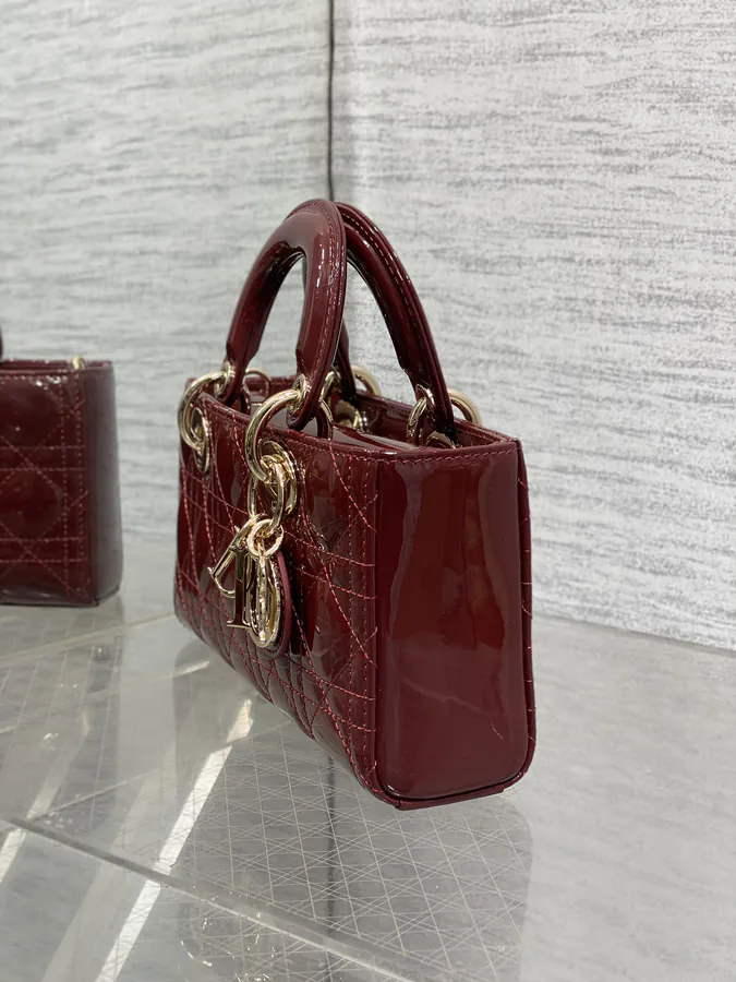 D joy Small Bucket Bag in Wine Red