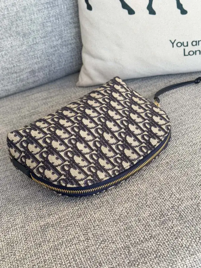 Blue Oblique Print Bucket Bag with Zippered Pockets