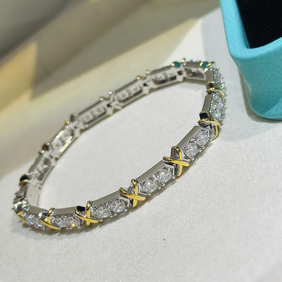 Schlumberger Series T Jewelry Four Prong Cross Diamond Bracelet