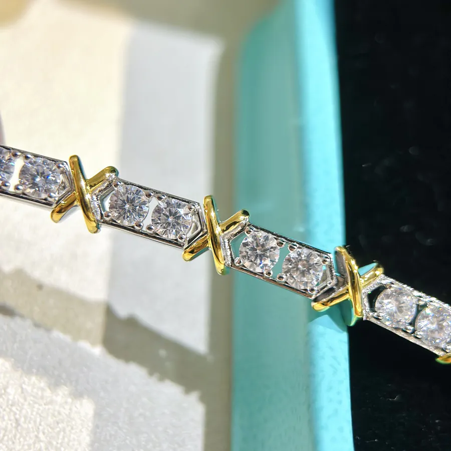 Schlumberger Series T Jewelry Four Prong Cross Diamond Bracelet