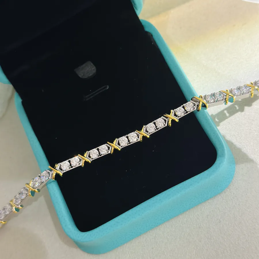 Schlumberger Series T Jewelry Four Prong Cross Diamond Bracelet