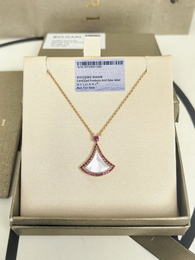 Bvlgari New Dress with White Pearl and Colorful Diamond Necklace