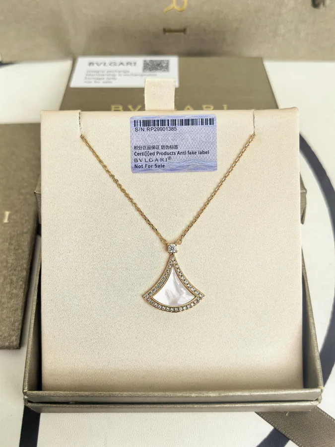 Bulgari New Dress with White Mother of Pearl and White Diamond Necklace