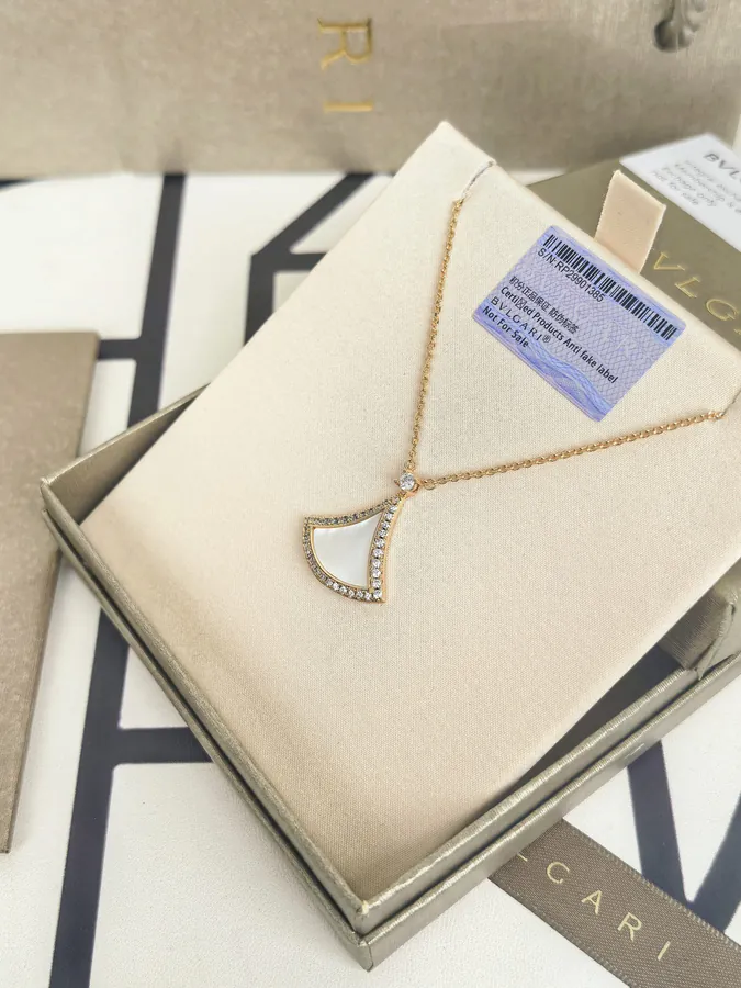 Bulgari New Dress with White Mother of Pearl and White Diamond Necklace