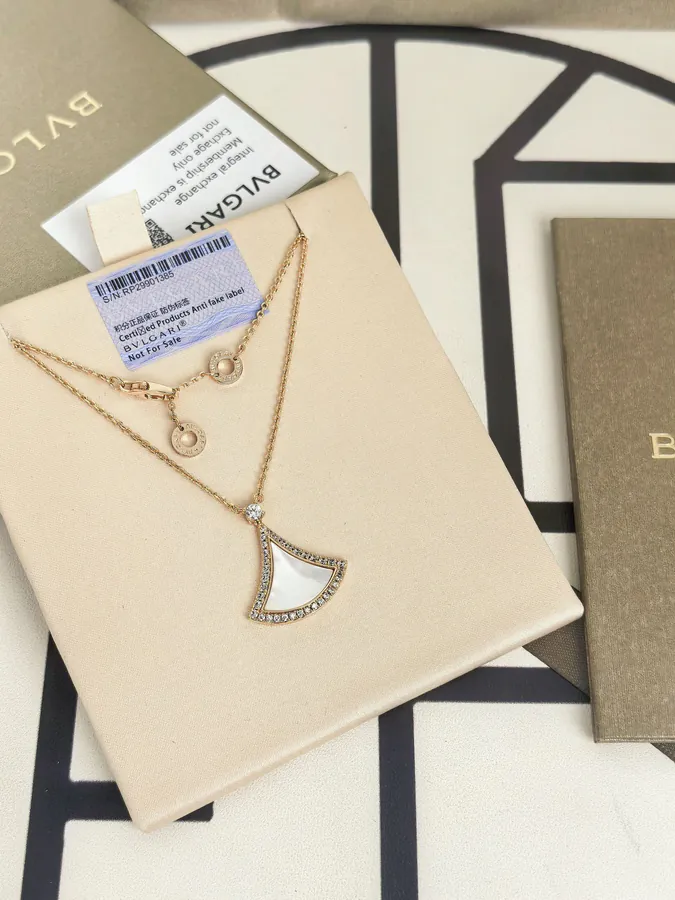 Bulgari New Dress with White Mother of Pearl and White Diamond Necklace