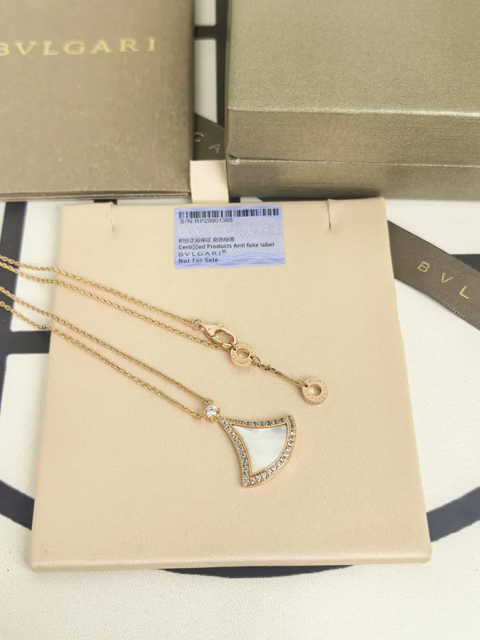 Bulgari New Dress with White Mother of Pearl and White Diamond Necklace