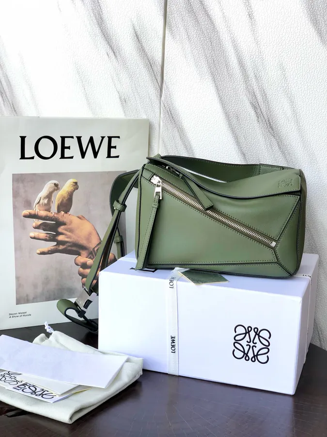 Puzzle Loe Bucket Bag with Adjustable Strap and Geometric Design