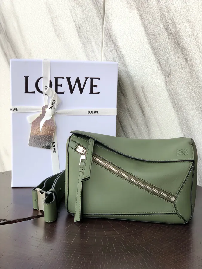 Puzzle Loe Bucket Bag with Adjustable Strap and Geometric Design