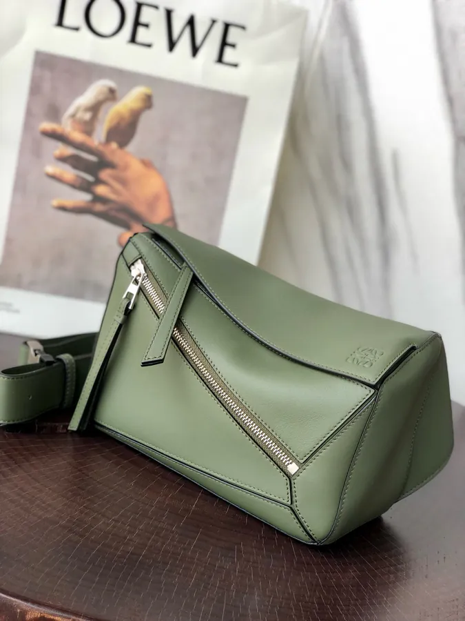 Puzzle Loe Bucket Bag with Adjustable Strap and Geometric Design