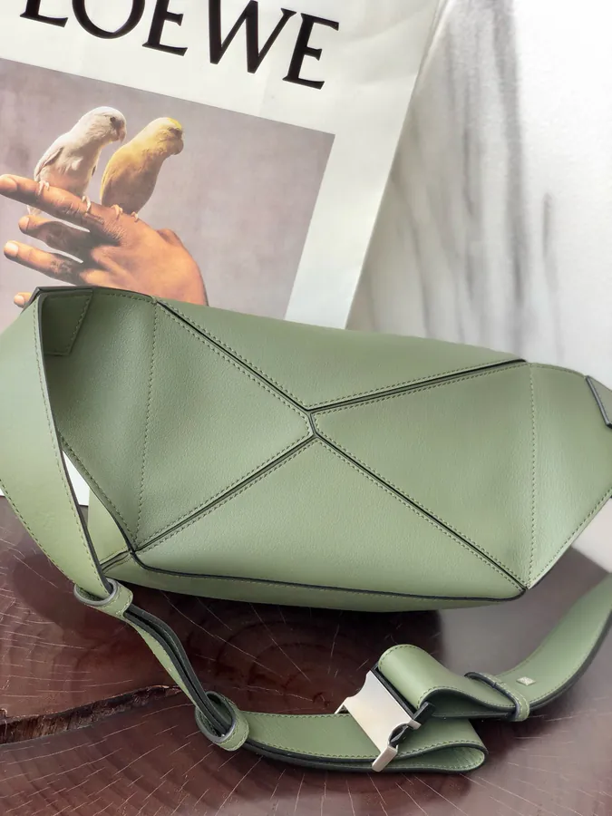 Puzzle Loe Bucket Bag with Adjustable Strap and Geometric Design