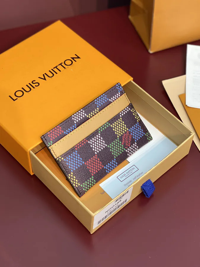 Pharrell Williams Wallet with LV Logo