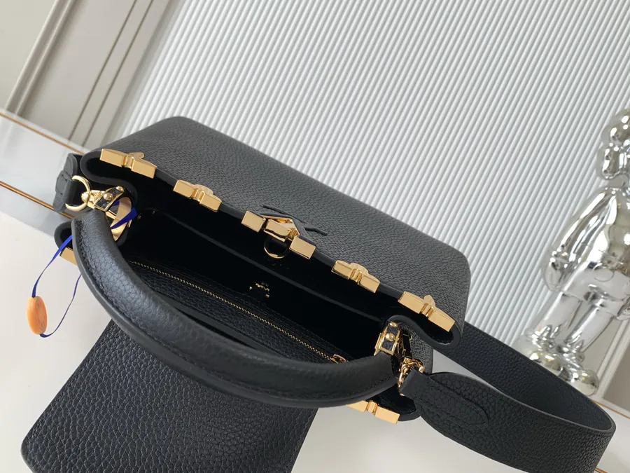 CAPUCINES Mini Handbag Elegant Luxury with Grained Calfskin