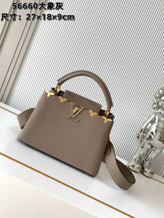 CAPUCINES Mini Handbag with Premium Leather and Elegant Gold Trim