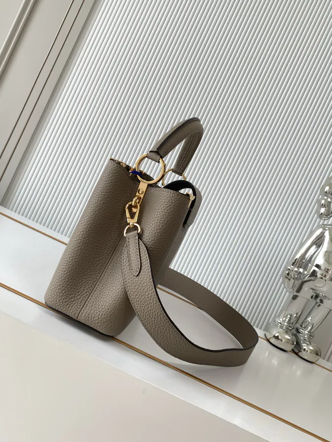 CAPUCINES Mini Handbag with Premium Leather and Elegant Gold Trim
