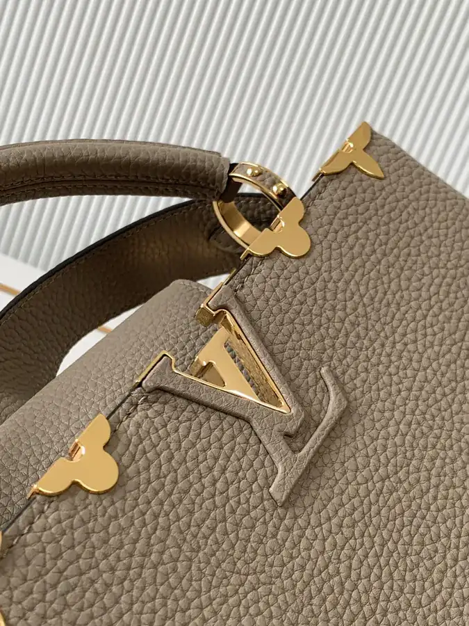 CAPUCINES Mini Handbag with Premium Leather and Elegant Gold Trim