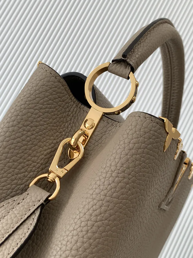 CAPUCINES Mini Handbag with Premium Leather and Elegant Gold Trim