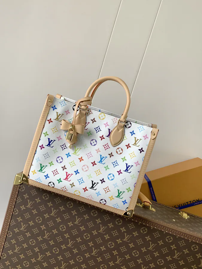 X Village OnTheGo Midsize Handbag with Monogram Canvas and Leather Trim