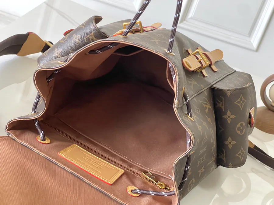 Christopher Small Backpack in Monogram Canvas