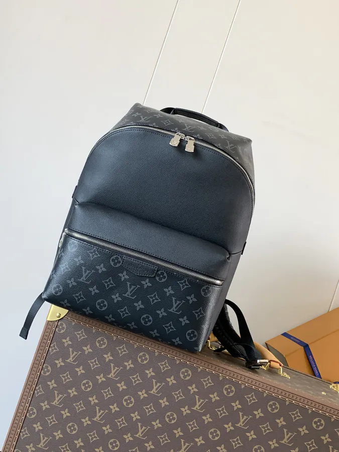 DISCOVERY Small Backpack with Monogram Canvas and Taïga Leather