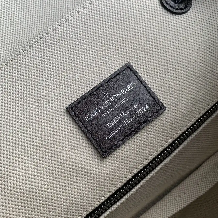 Christopher Midsize Backpack by Pharrell Williams