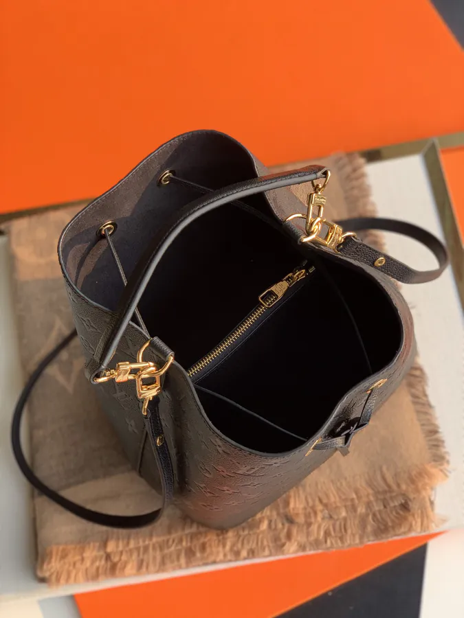 NéoNoé Mid Sized Bucket Bag in Monogram Empreinte