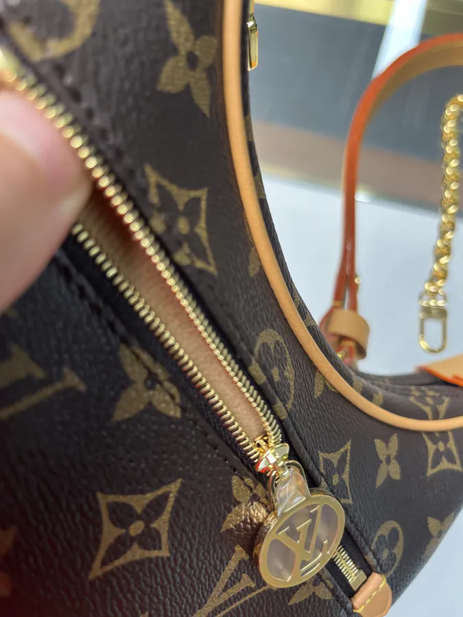 LOOP Half Moon Croissant Bag by Nicolas Ghesquière