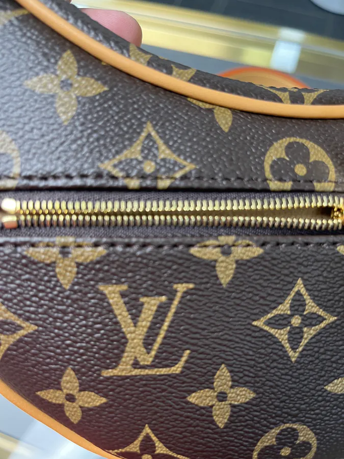 LOOP Half Moon Croissant Bag by Nicolas Ghesquière