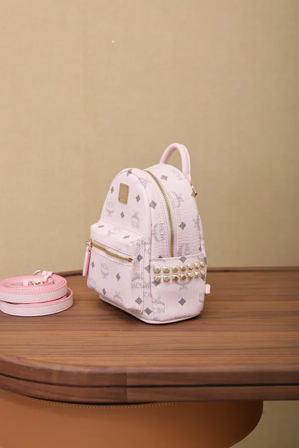 MCM Stark Visetos Mini Backpack with Nappa Trim and Rivets