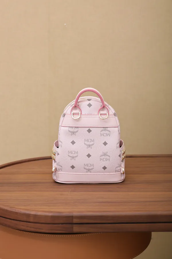 MCM Stark Visetos Mini Backpack with Nappa Trim and Rivets