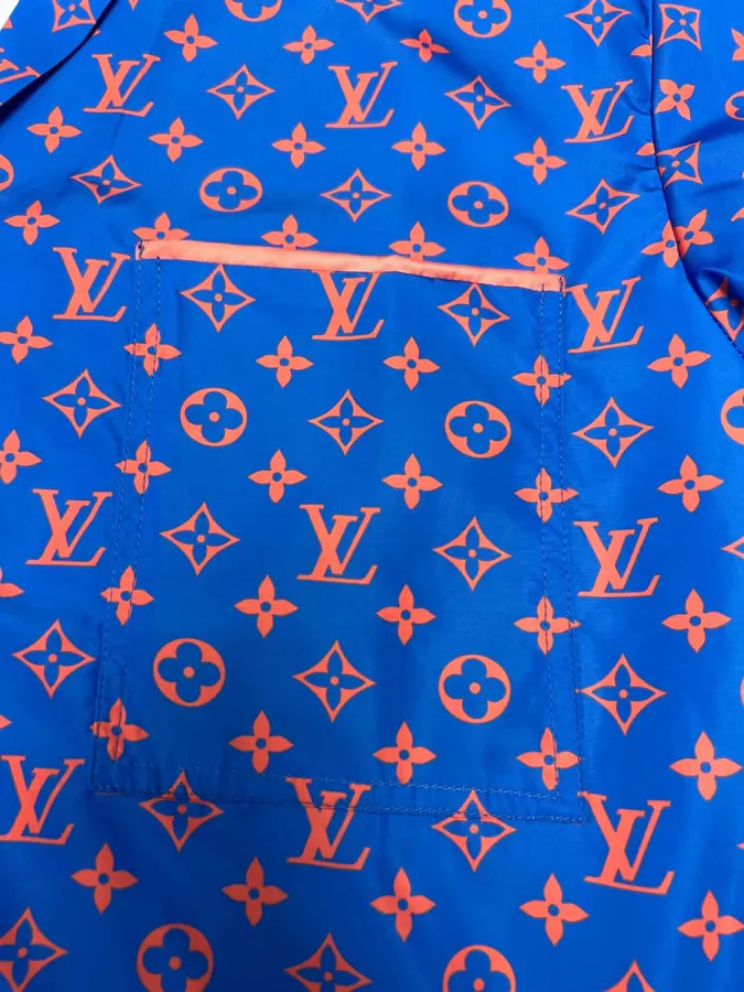 P210 Monogram Glow Bucket Bag