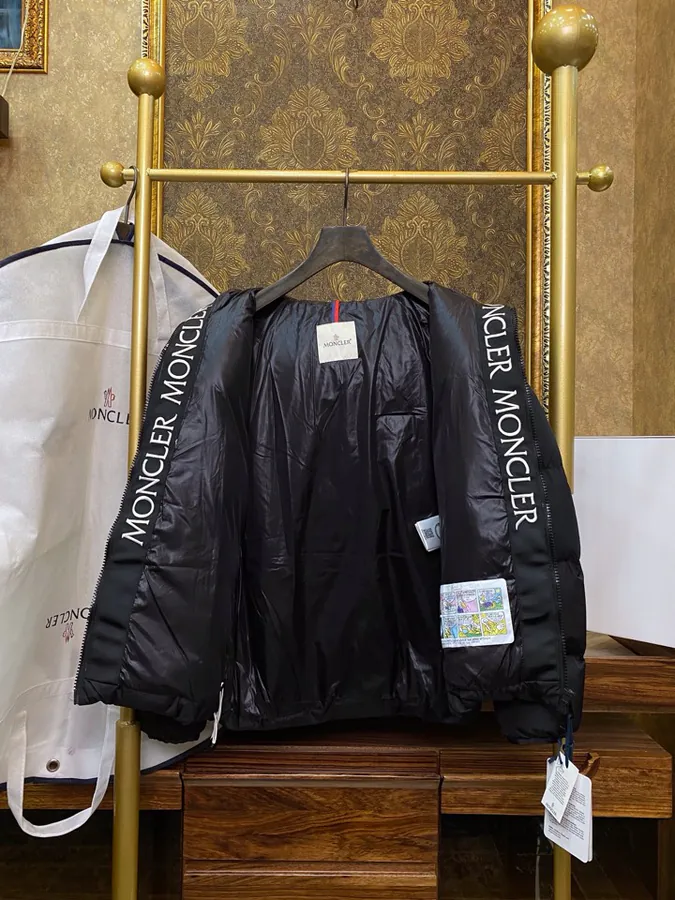 Moncler Men's and Women's Hooded Down Jacket with 80s Style Design