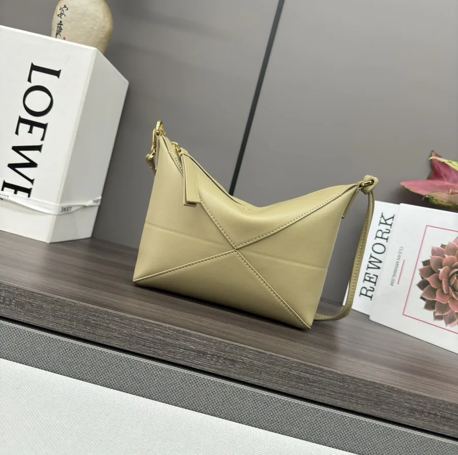 Lewell Puzzle Fold Pouch Geometric Inspired Handbag