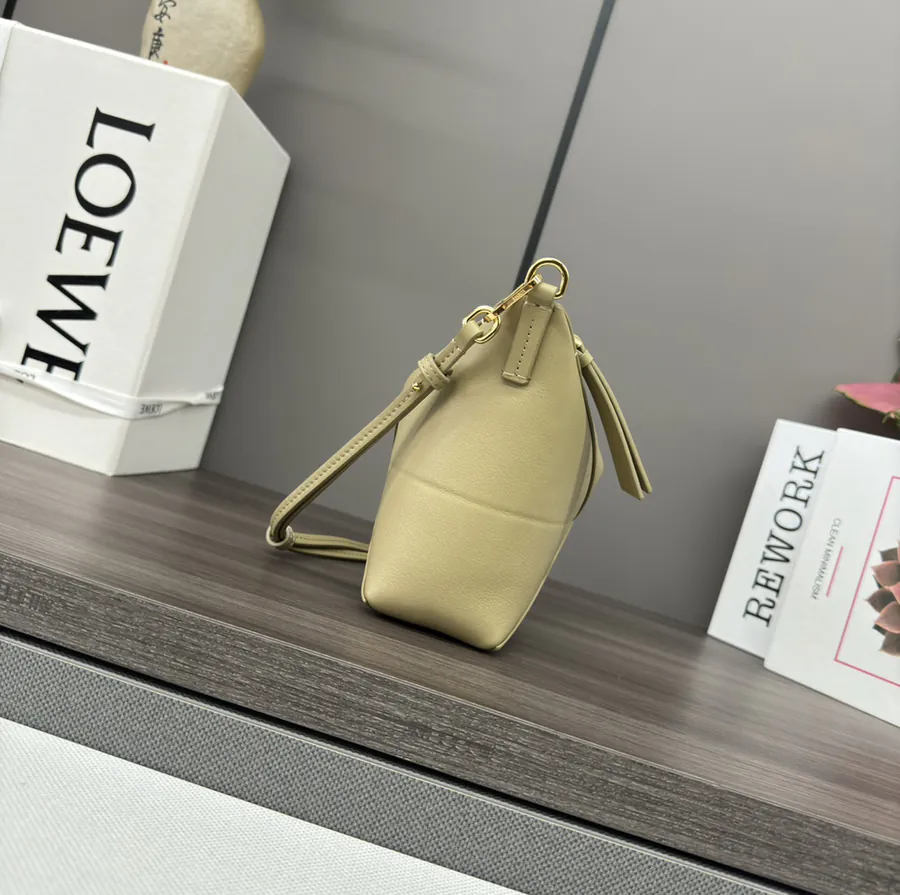 Lewell Puzzle Fold Pouch Geometric Inspired Handbag