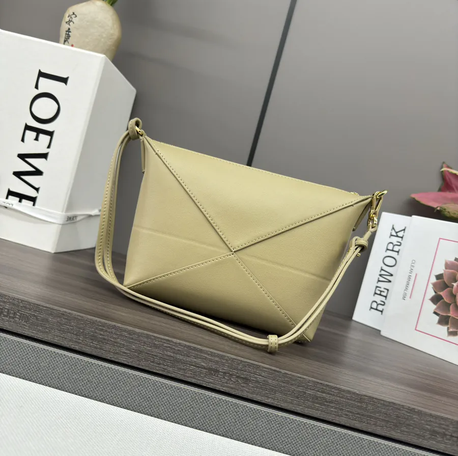 Lewell Puzzle Fold Pouch Geometric Inspired Handbag