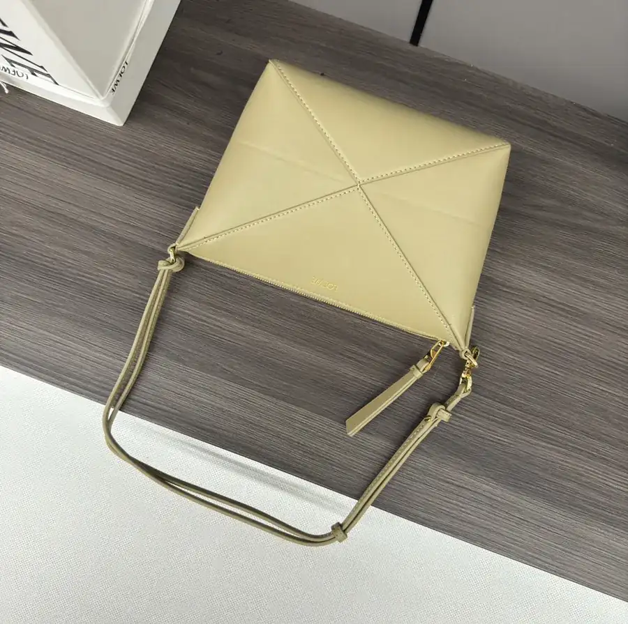 Lewell Puzzle Fold Pouch Geometric Inspired Handbag