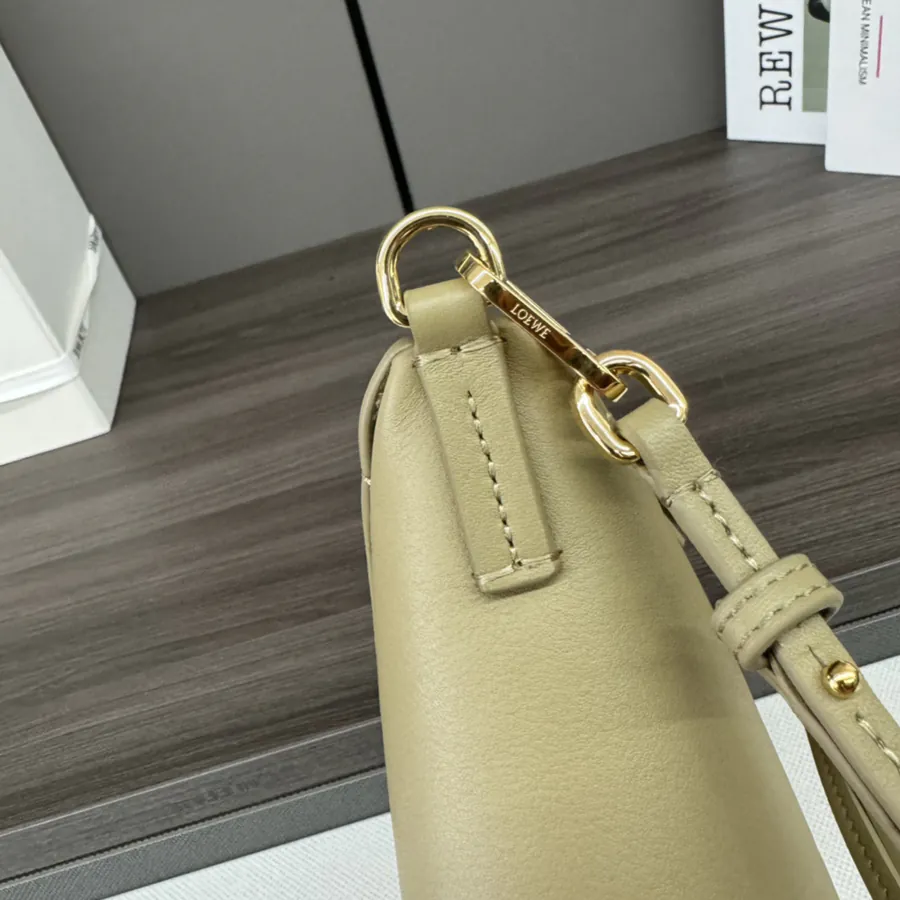 Lewell Puzzle Fold Pouch Geometric Inspired Handbag