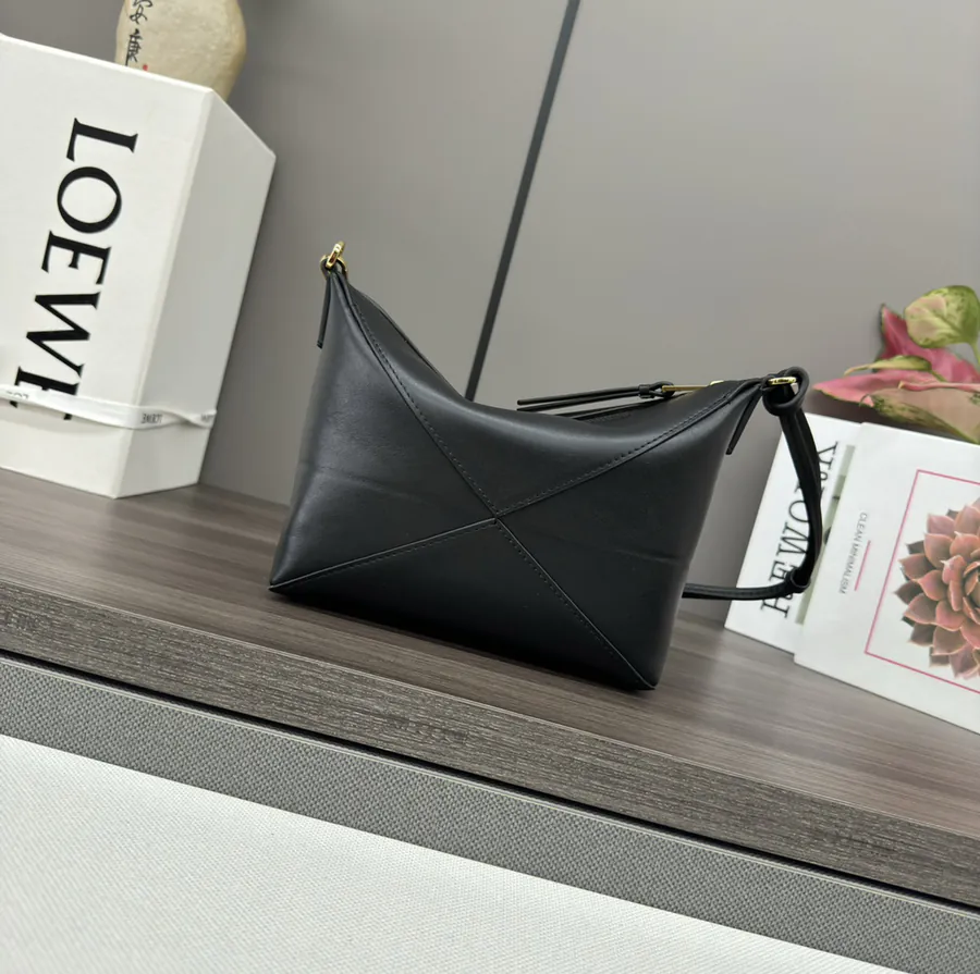 Lewell Puzzle Fold Pouch Geometric Inspired Handbag