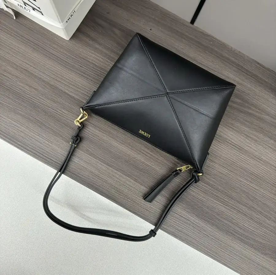 Lewell Puzzle Fold Pouch Geometric Inspired Handbag