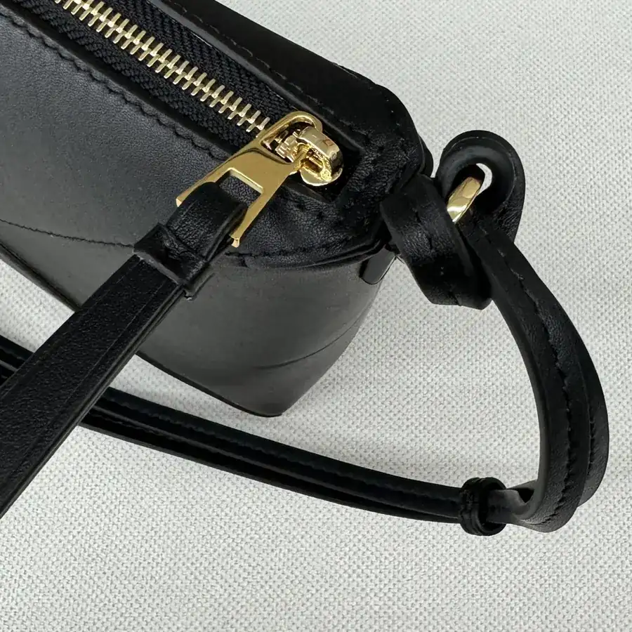 Lewell Puzzle Fold Pouch Geometric Inspired Handbag