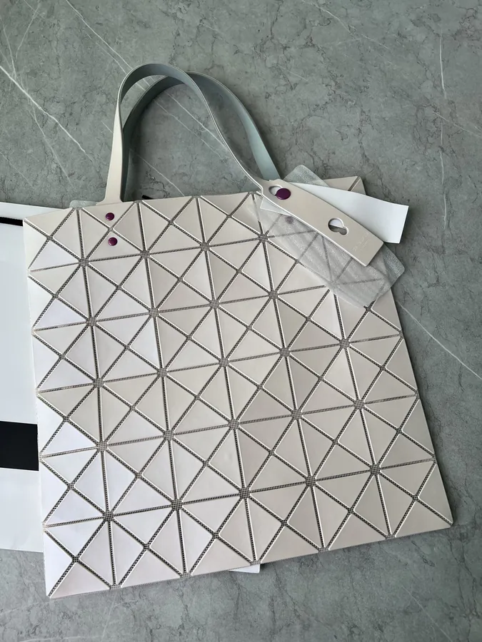 Three's Company Collaboration Shopping Bag
